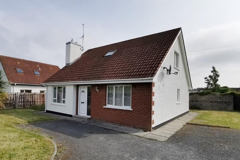 Four bed detached chalet on Springdale Crescent, Kilkeel.  Average house price in Newry, Mourne and Down - £159,305.