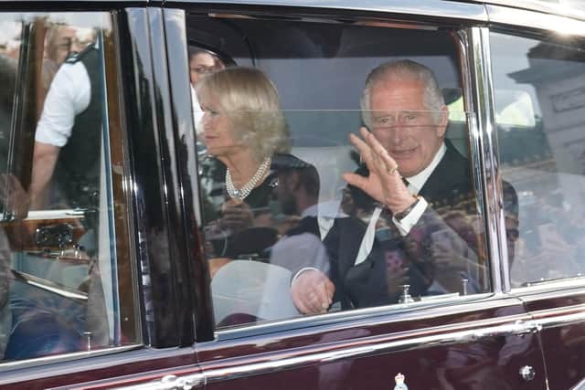 A car carrying King Charles III and The Queen leaving Buckingham Palace, following the death of Queen Elizabeth II on Thursday.  Picture date: Friday September 9, 2022. PA Photo. See PA story DEATH Queen. Photo credit should read: James Manning/PA Wire