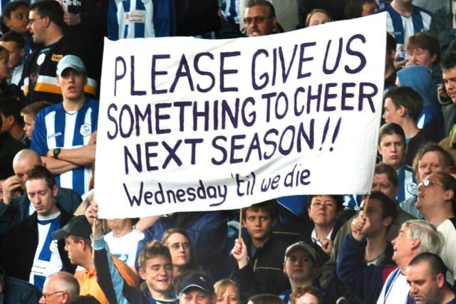 Wednesday fans with a message from the stands at the end of the seaosn in 2004