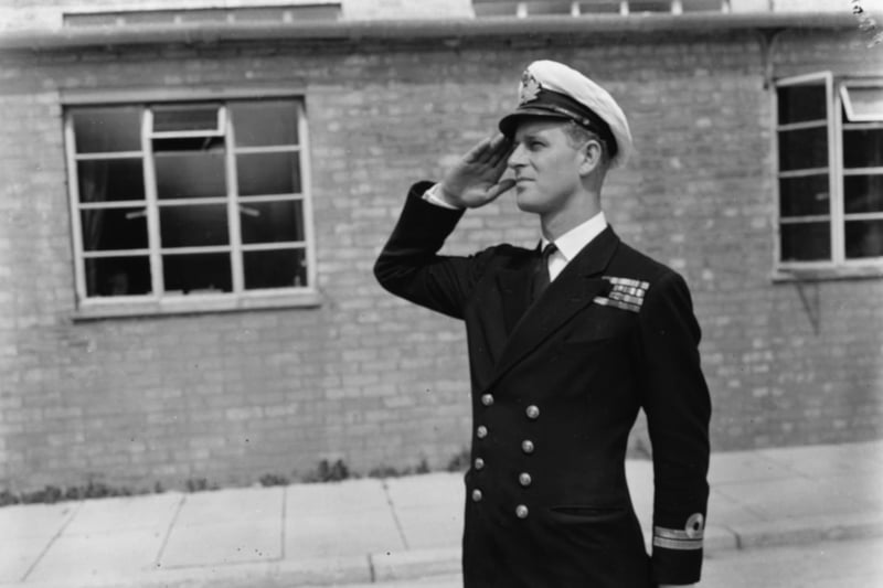Lieutenant Philip Mountbatten, prior to his marriage to Princess Elizabeth, saluting as he resumes his attendance at the Royal Naval Officers School at Kingsmoor, Hawthorn, in 1947. (Photo: Keystone/Getty Images)