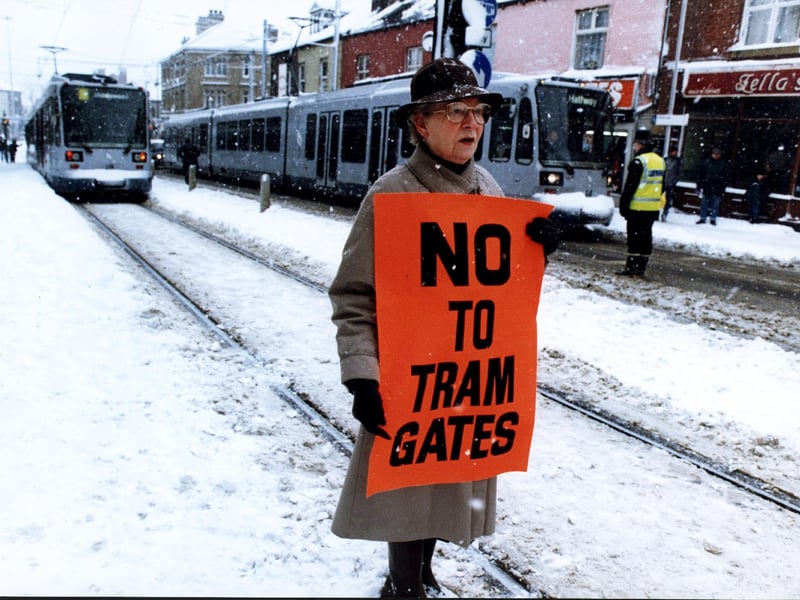 Vera Waller, whose family has had businesses in Hillsborough since 1902, protests against the tram gates at Hillsborough Corner in October 1996