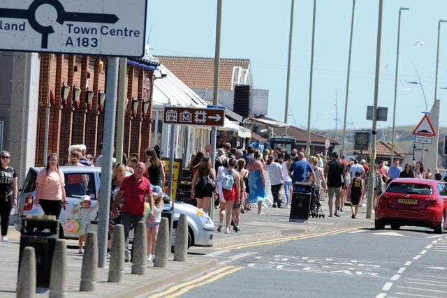 Queues form at Ocean Beach Pleasure Park takeaways to enjoy the likes of chips and ice cream at the seaside.