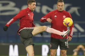 Chris Basham and Phil Jagielka (R) warm-up for Sheffield United: Andrew Yates/Sportimage