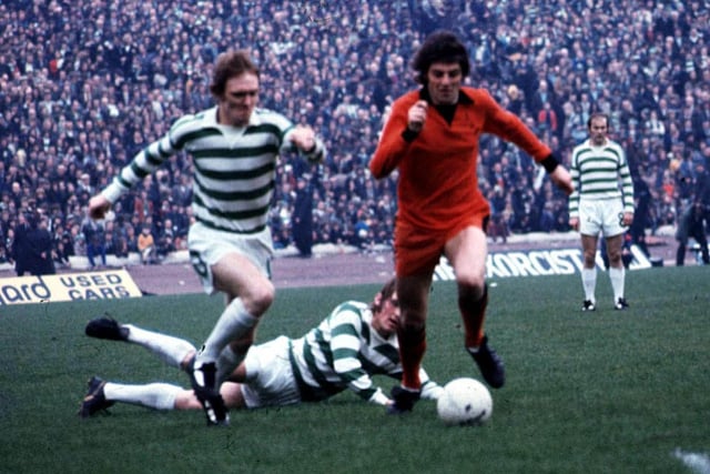 Smith takes on Kenny Dalglish and Davie Hay during the 1974 Scottish Cup final, which Dundee United would lose 2-0. He spent 12 seasons at United across two spells, while also spending time at Dumbarton.