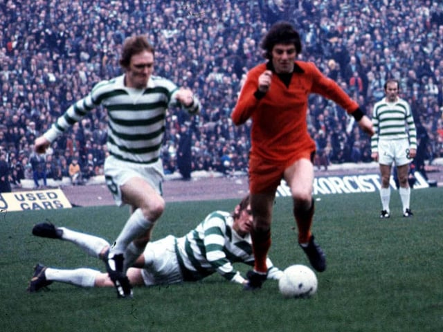 Smith takes on Kenny Dalglish and Davie Hay during the 1974 Scottish Cup final, which Dundee United would lose 2-0. He spent 12 seasons at United across two spells, while also spending time at Dumbarton.