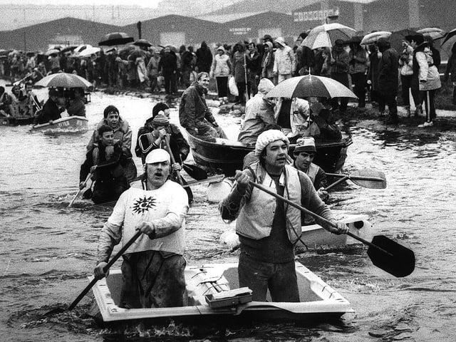 A raft race in the rain at Greenland Road, Darnall, in aid of Muscular Dystrophy....May 1983