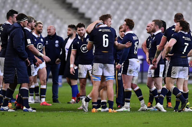 Scotland players celebrate victory after their Guinness Six Nations Rugby championship match against France (Photo by Aurelien Meunier/Getty Images)