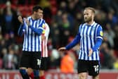 Sheffield Wednesday's Barry Bannan (right) appears dejected after the final whistle in the Sky Bet League One match at the Stadium of Light, Sunderland. Richard Sellers/PA Wire.