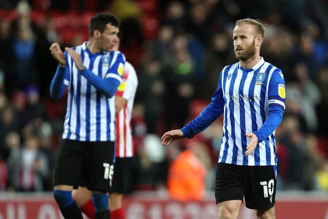 Sheffield Wednesday's Barry Bannan (right) appears dejected after the final whistle in the Sky Bet League One match at the Stadium of Light, Sunderland. Richard Sellers/PA Wire.