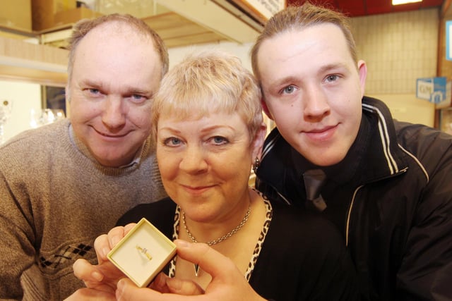 Gary Noble and Jan Boland from Golden moments  jewllers with the £1000 ring and Valentines event organiser Daniel Watson.