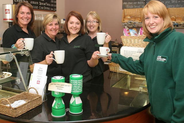 Amy Jukes of Macmillan called in at Chapel's In a Pickle cafe to thank staff for donating their tips and holding a big coffee morning in 2009. Staff members - Avril Luke, Dorothy Swales, Sara Smith and Gill Simpson.