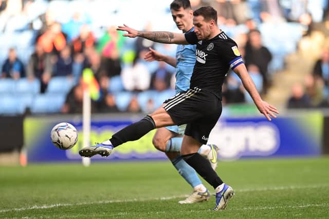 Billy Sharp of Sheffield United takes a shot on goal against Coventry City: Ashley Crowden / Sportimage
