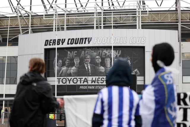 DERBY, ENGLAND - MAY 08: Sheffield Wednesday fans gather outside the stadium prior to the Sky Bet Championship match between Derby County and Sheffield Wednesday at Pride Park Stadium on May 08, 2021 in Derby, England. Sporting stadiums around the UK remain under strict restrictions due to the Coronavirus Pandemic as Government social distancing laws prohibit fans inside venues resulting in games being played behind closed doors. (Photo by Alex Pantling/Getty Images)