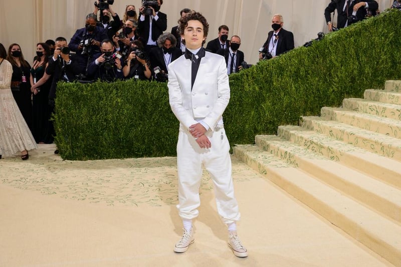 Fellow co-chair Timothee Chalamet mixed classic American style with his white Converse and sweatpants with a Haider Ackermann tuxedo jacket.