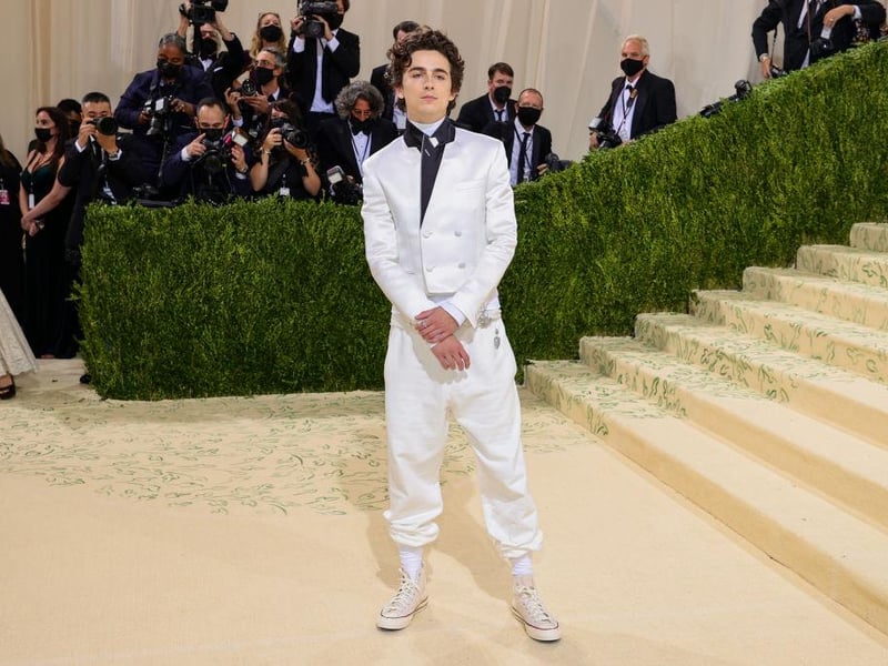 Fellow co-chair Timothee Chalamet mixed classic American style with his white Converse and sweatpants with a Haider Ackermann tuxedo jacket.