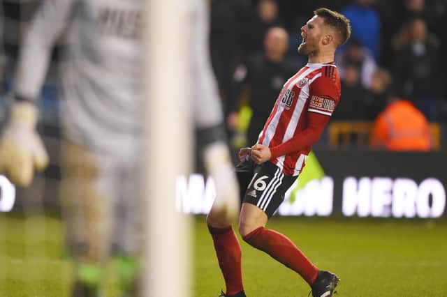 Oliver Norwood helped book Sheffield United's place in the fifth round of the FA Cup by scoring at Millwall: Robin Parker/Sportimage