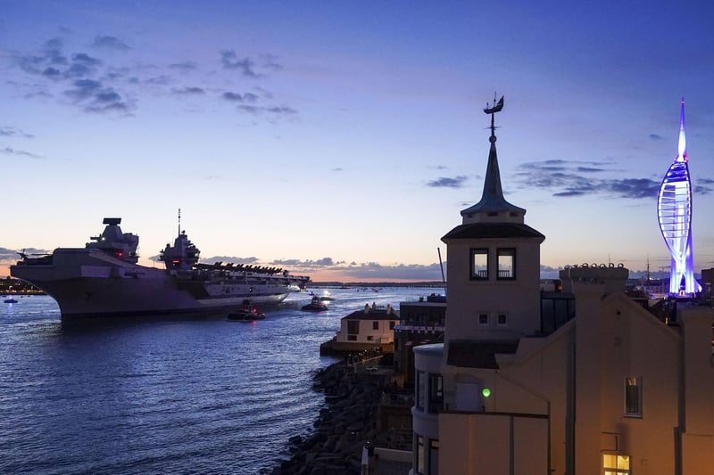 HMS Queen Elizabeth departs HM Naval Base, Portsmouth, for her maiden deployment to lead the UK Carrier Strike Group on a 28-week operational deployment travelling over 26,000 nautical miles from the Mediterranean to the Philippine Sea. Picture date: May 22, 2021. Picture: Steve Parsons/PA Wire