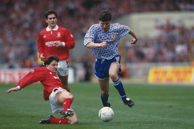Dennis Irwin of Manchester Utd holds onto the ball as Nigel Clough looks on during Forest's 1-0 defeat to Manchester United in the 1992 Rumbelows Football League Cup final.
Clough won 2 League Cups and 2 Full Members' Cup during his playing career.