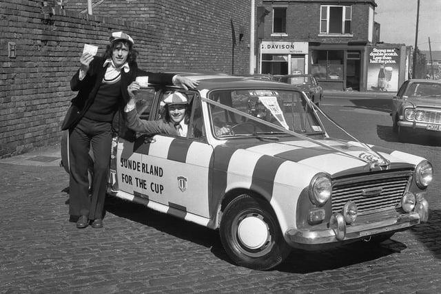 These fans had tickets and a decorated car for the cup final. And in the background, you can spot G.Davison butchers.