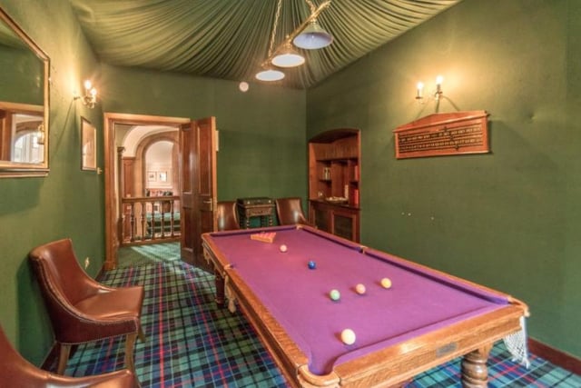 The games room has two open display presses, tartan flooring and a snooker table to keep you entertained