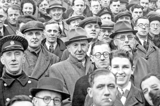 Spectators at Bramall Lane in the 1920s or 1930s, when it would appear supporters dressed a little more smartly than today