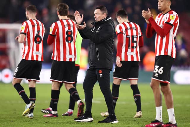 Paul Heckingbottom and his Sheffield United players salute the supporters: Naomi Baker/Getty Images
