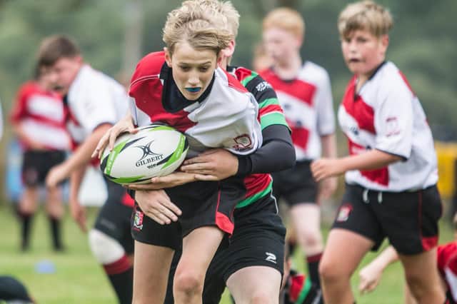 George Brydon on the ball for Peebles at Earlston's youth rugby festival