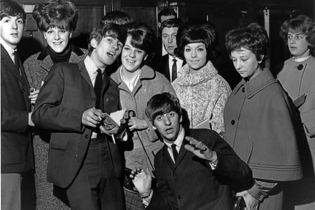 Three of The Beatles meeting fans at Sheffield City Hall in November 1963