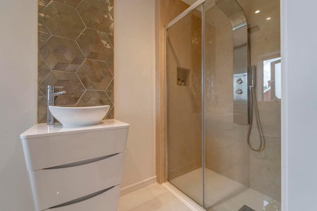 Another example of the impressive en suite facilities at The Pinnacle. A modern walk-in shower is at the heart of the room.