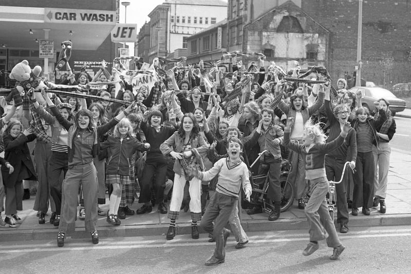 Bay City Rollers fans screaming "We love you, Rollers" as they stage a demonstration outside the Sunderland Echo office before going to the Empire Theatre in May 1975, when their heroes were banned from playing the venue