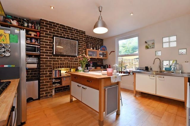 This stylish kitchen is simply lovely and has a number of key appliances integrated into it, including a dishwasher, oven and hob.