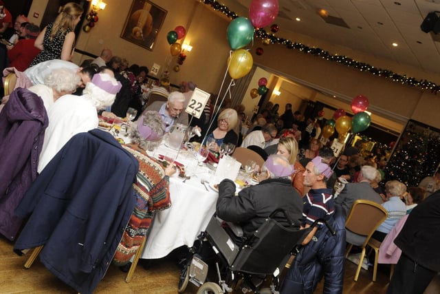 Mrs Christmas, Gloria Stewart, hosts the annual Christmas meal for the elderly at Niagara Leisure Centre in Sheffield, December 17, 2013