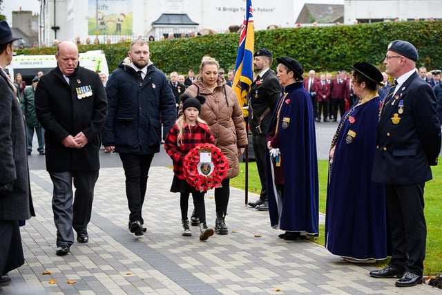 Laying a wreath at Larne Cenotaph.