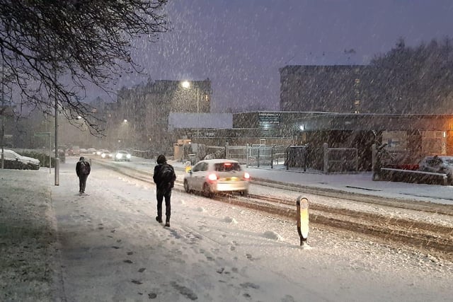 Children trudged through the snow on their way to school in Broomhill, Glasgow.