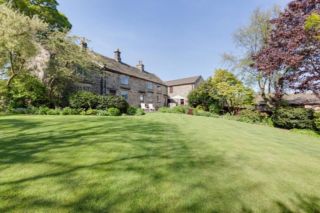 The house comes with approximately eight acres of gardens, grounds and paddocks.