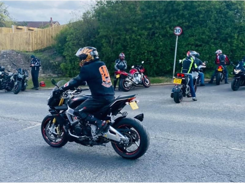 Bikers held a minute's silence before a minute's noise.