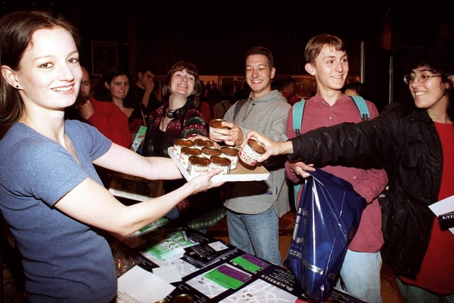 Gwen Bernath of Blackwell's Book Shop handing out free tins of beans to students at the fresher fayre in September 1996