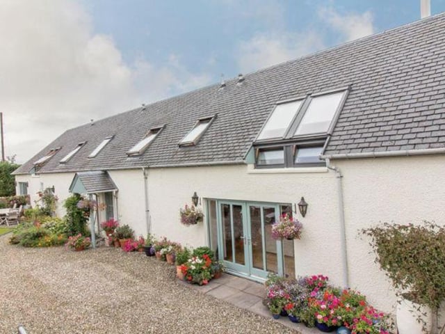 This four bedroom converted stables was renovated by the award winning developer 'Red Door Cottages' and offers spacious living across two levels. The property is roughly 2,300 square feet and some of its most character filled features include the lounge’s log burning stove, and the master bedroom’s combed ceilings and exposed beams. Listed on OntheMarket for 375,000 GBP