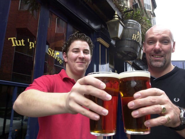 Tut 'n' Shive is Doncaster CAMRA's Pub of the Season for Autumn 2001. Our picture shows the West Laith Gate pub's licencee Nick Coster (right) and his assistant manager Andrew Butler celebrating the award.