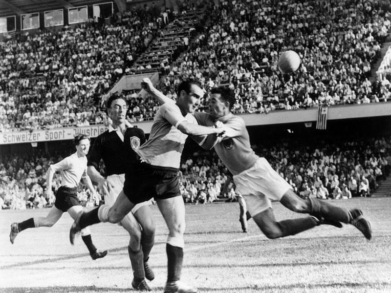 Scotland's first World Cup campaign ended in a heavy defeat with the national side bottom of a section including Austria, Czechslovakia and the South Americans who hammered seven by Fred Martin in Basle with no goals scored in Switzerland.