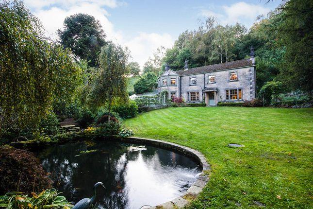 This four-bedroom detached residence, with a separate gardener's cottage in the grounds providing additional accommodation, is on the market for £1.35 million with Bagshaws Residential.