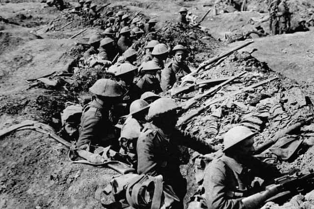 Undated file photo of British infantrymen occupying a shallow trench in a ruined landscape before an advance during the Battle of the Somme. Candle-lit vigils could be held at churches and buildings across the country to mark next year's Great War centenary.   PRESS ASSOCIATION Photo. Issue date: Monday June 10, 2013. On August 4 2014 it will be 100 years since war was declared, pitching the nation into one of its hardest and darkest chapters. The centenary's highlight will be a candle-lit vigil of prayer and penitence at Westminster Abbey finishing, with the last candle being extinguished at 11pm - the moment war was declared. See PA story POLITICS Centenary. Photo credit should read: PA/PA Wire 