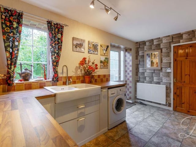 A second view of the utility room at the Mansfield Road property. Notice how spacious and bright it is.