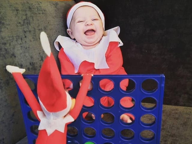 A very cheeky Bubbles enjoying a game of Connect 4