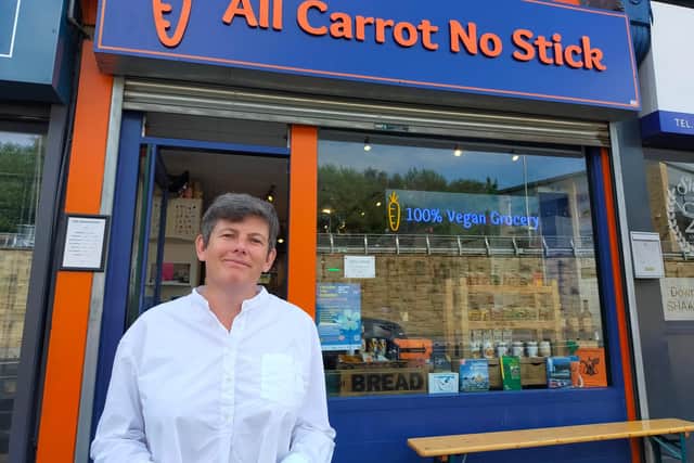 Gail Cooke of All Carrot No Stick says it is "so, so scary" to watch the floodwater approach her shop door whenever it rains.
