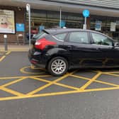 A Sheffield woman has shared her anger after watching a driver park over two disabled bays at a local Co-op.