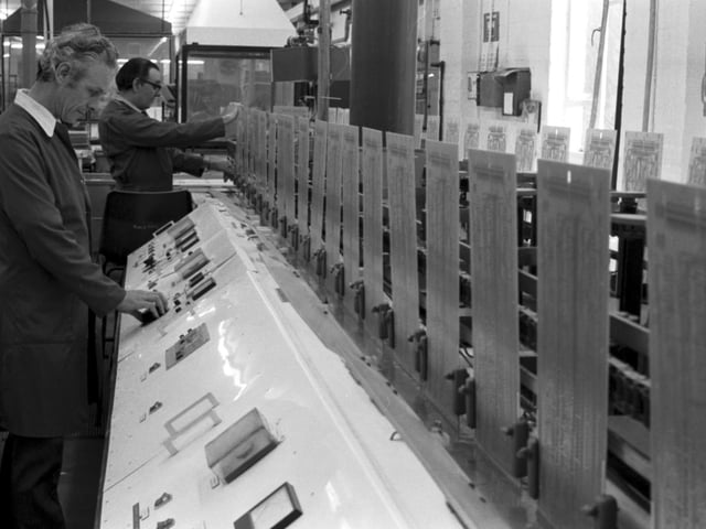 Men working on the Selectaflex line at Exacta Circuits in Galashiels, April 1980.