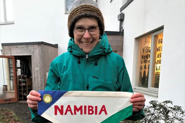 Rachel of Sheffield Creative Action for Peace (SCRAP) with the Namibia pennant