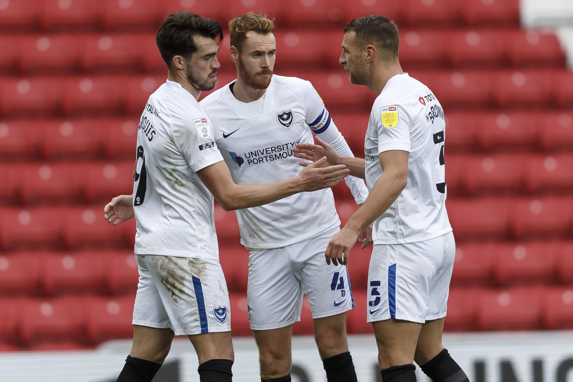 John Marquis, left, is congratulated by Tom Naylor and Lee Brown following his 25th-minute strike.  Picture: Daniel Chesterton/phcimages.com