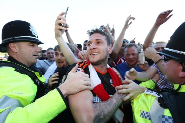 Sheffield United's Billy Sharp celebrates promotion during the League One match at the Sixfields Stadium, Northampton.  Pic David Klein/Sportimage